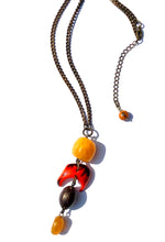 Load image into Gallery viewer, Orange Agate and Amazon seed pendant
