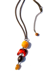 Orange Agate and Amazon seed pendant
