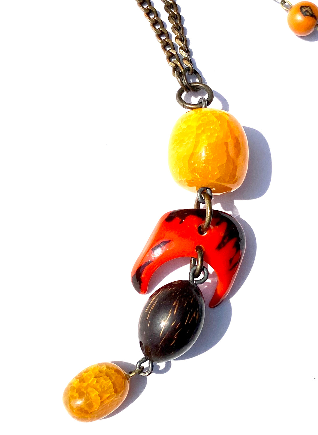 Orange Agate and Amazon seed pendant